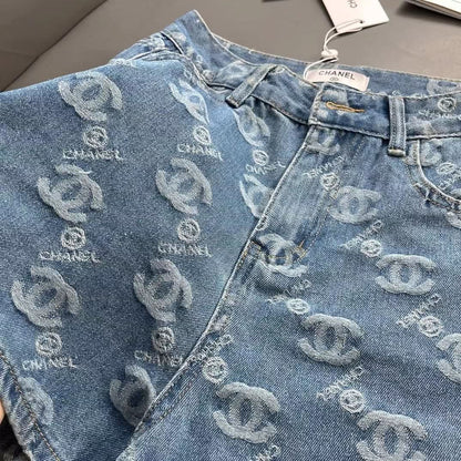 Denim shorts with all-over logo embroidery