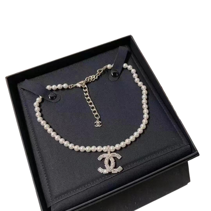 New pearl and diamond logo necklace