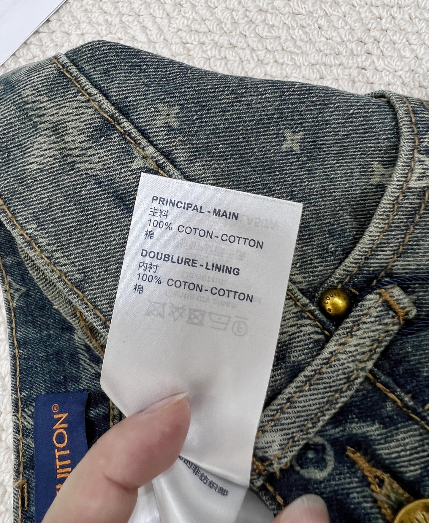 Laser-burned logo denim shorts